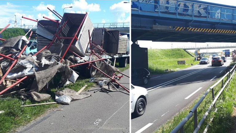 Bestuurder met te hoge lading op aanhanger botst tegen spoorbrug over N242