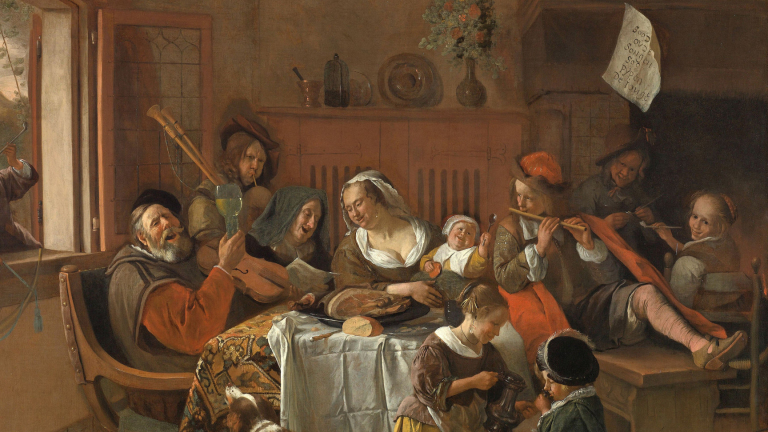 Groepsscène van mensen die muziek maken en drinken rond een tafel met eten, in een ouderwetse, huiselijke setting.