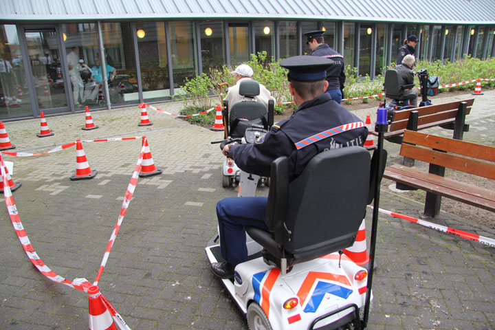 politie scootmobiel in actie